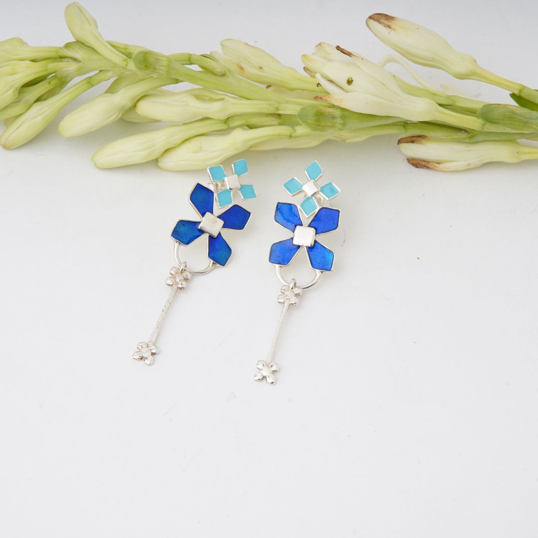 92.5 Sterling Silver Floral Dangler Earrings with blue enamel 92.5 Sterling Silver Floral Dangler Earrings with blue enamel