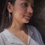 Lotus 92.5 sterling silver charm with pink enamel and tassels