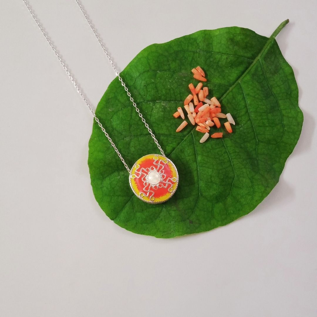 Swastik 925 pendant with red yellow enamel Swastik 92.5 sterling silver pendant with red yellow enamel